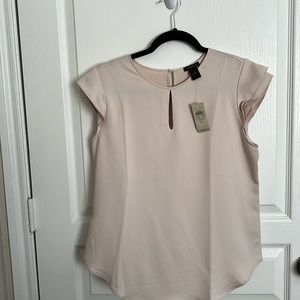 Ann Taylor cap sleeve top. Cream color.
